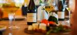 A bottle of Pinot Noir on a table